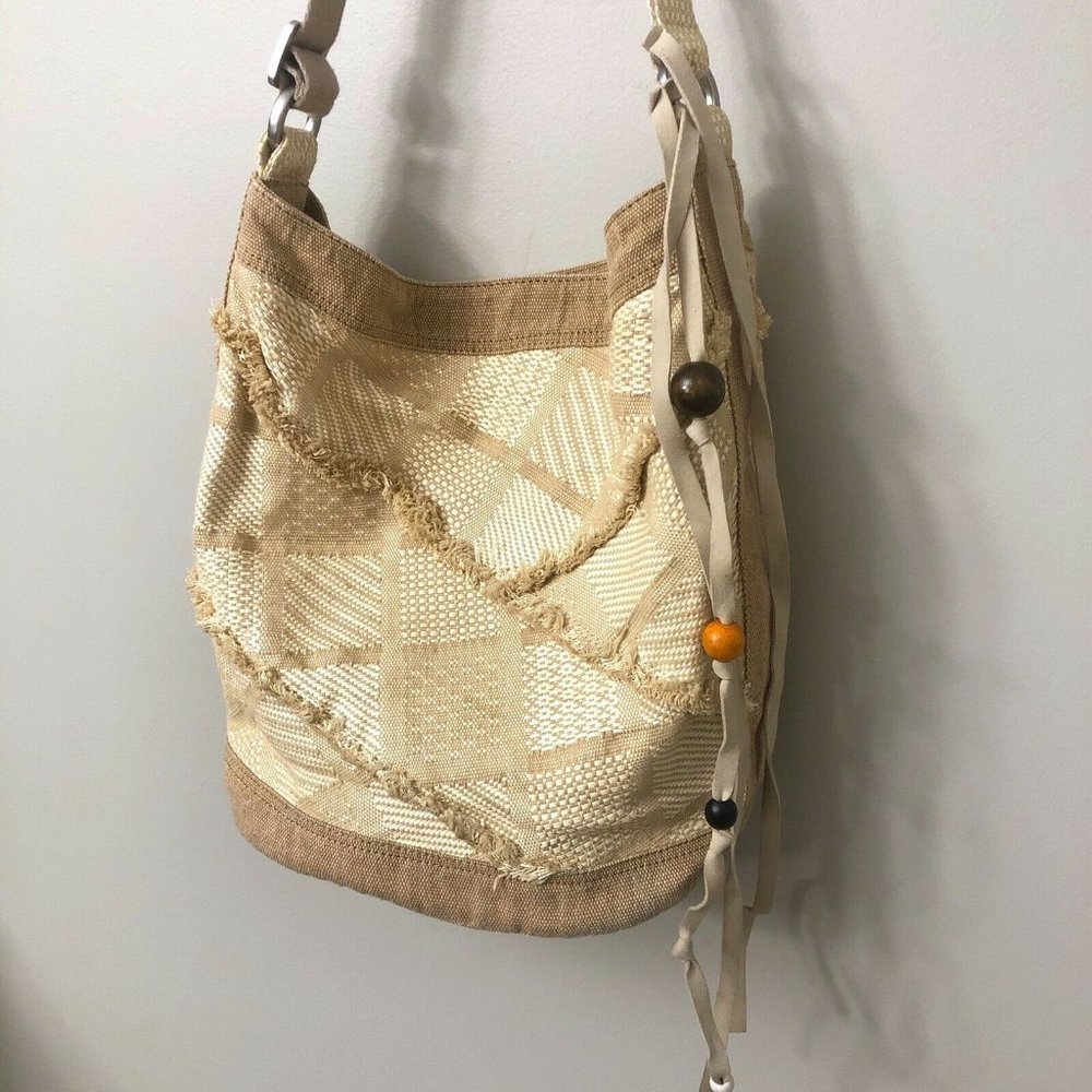 Tom’s Beige Fringe Accent Canvas Bucket Bag